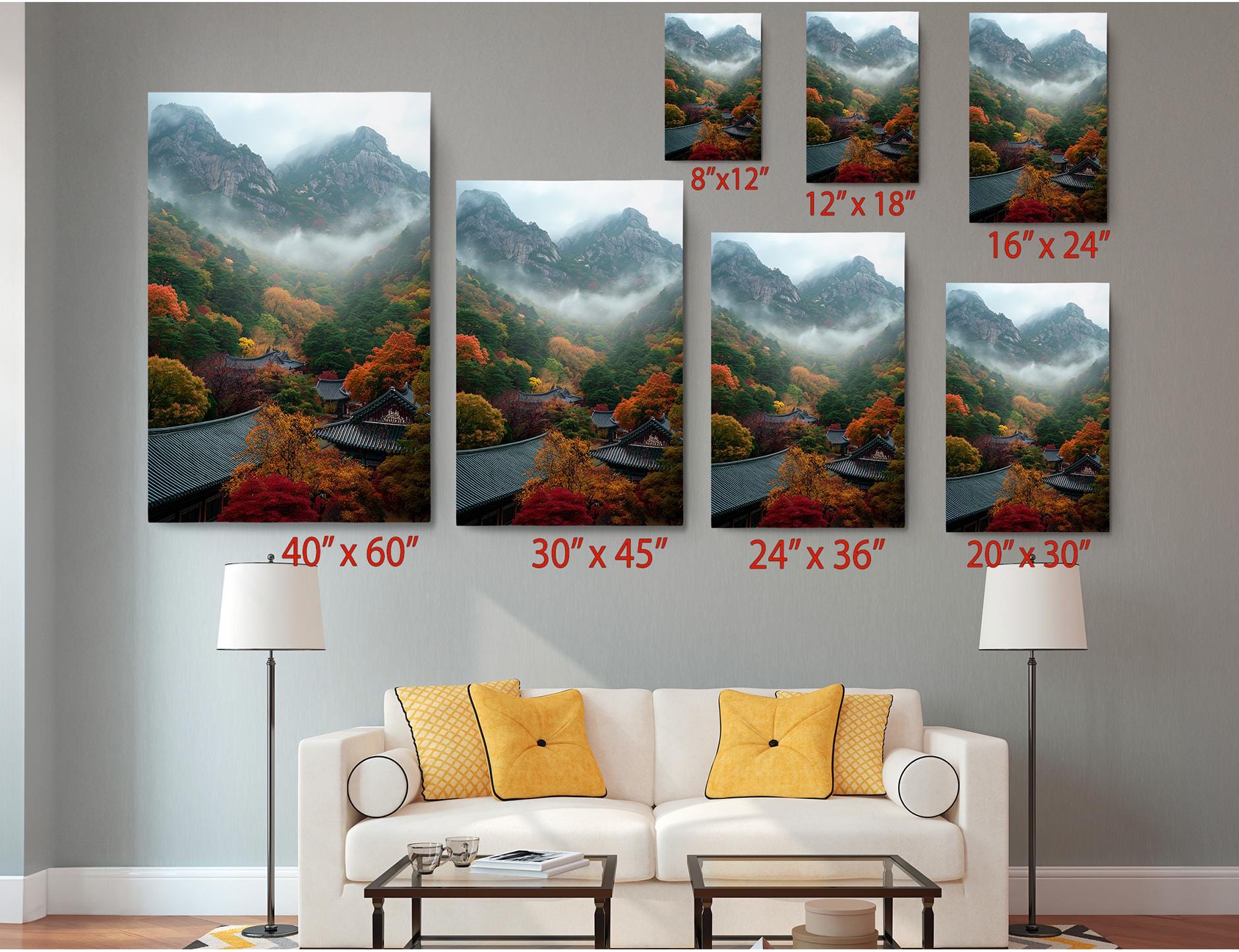 The image is a living room with a white sofa and a coffee table. Above the sofa, there are six framed landscape photographs of mountains, each with a different size and resolution, ranging from 8 x 12 to 20 x 30 inches. The photographs are arranged in a grid-like pattern on the wall, creating a visually appealing display.