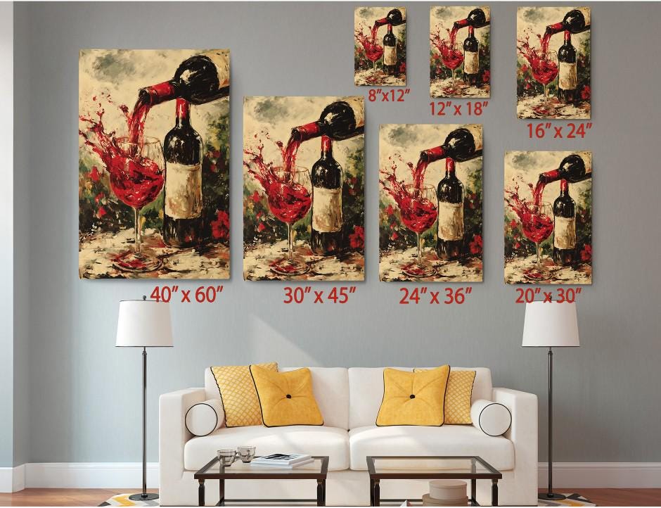 The image is a living room with a white couch and a coffee table. Above the couch, there are six framed paintings of wine bottles and glasses, each with a different size and resolution. The paintings depict various stages of wine pouring, including the liquid spilling out of the bottle and the wine glass. The paintings are arranged in a grid-like pattern on the wall, creating a visually appealing display.