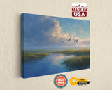 The image is a painting of a serene landscape with a body of water, grassy fields, and a cloudy sky.