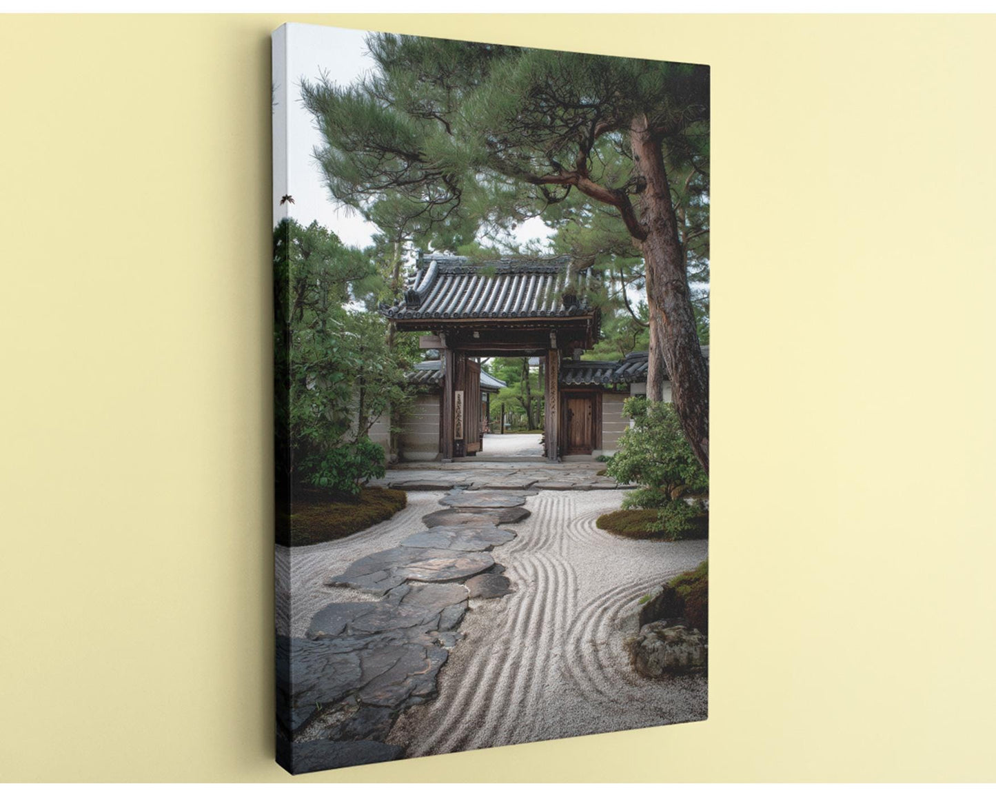 A traditional Japanese temple gate surrounded by a serene garden with a stone path leading up to it.