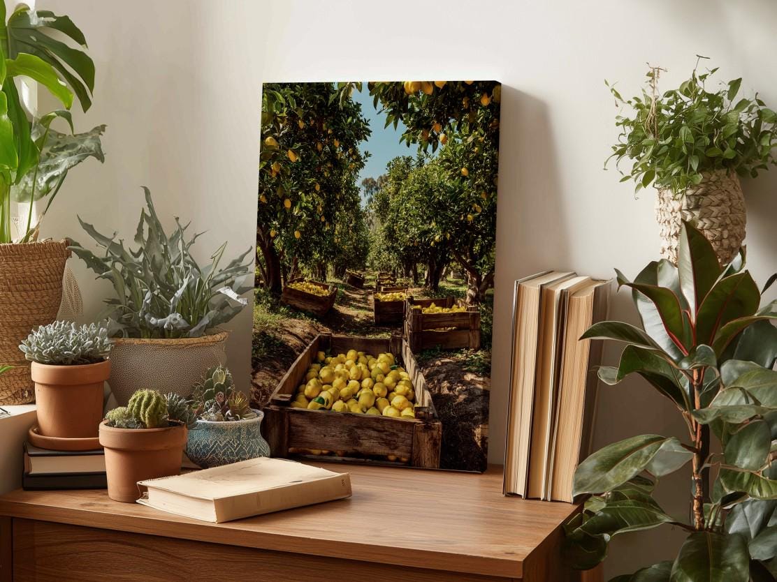 a wooden table with various potted plants, a stack of books, and a wooden crate filled with lemons. In the background, there is a painting of an orange grove with crates of lemons.
