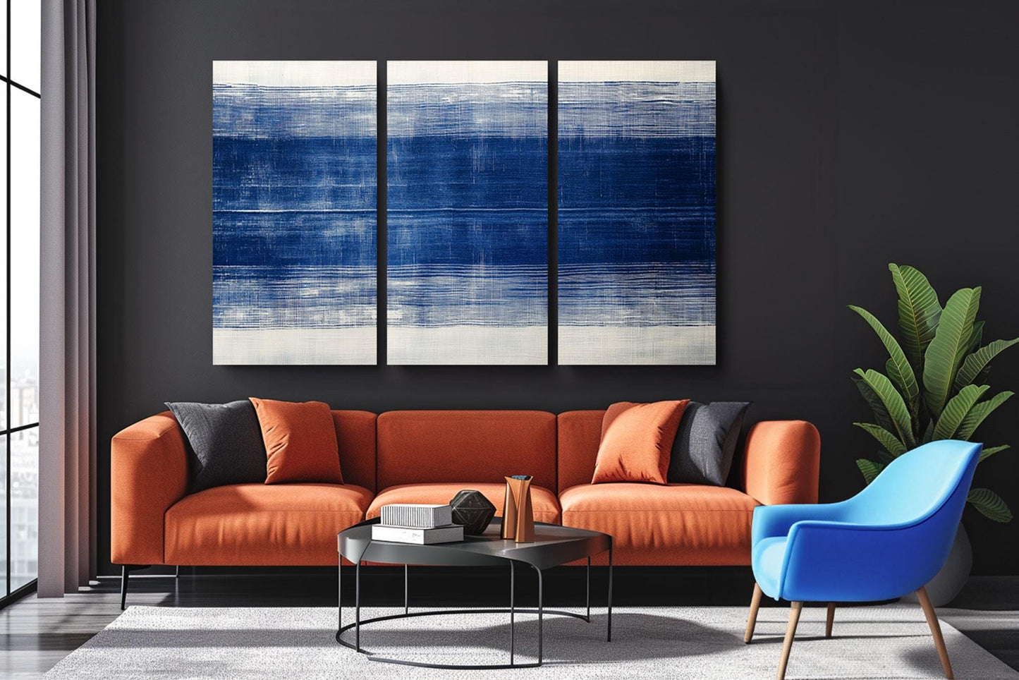 a living room with a couch and two chairs