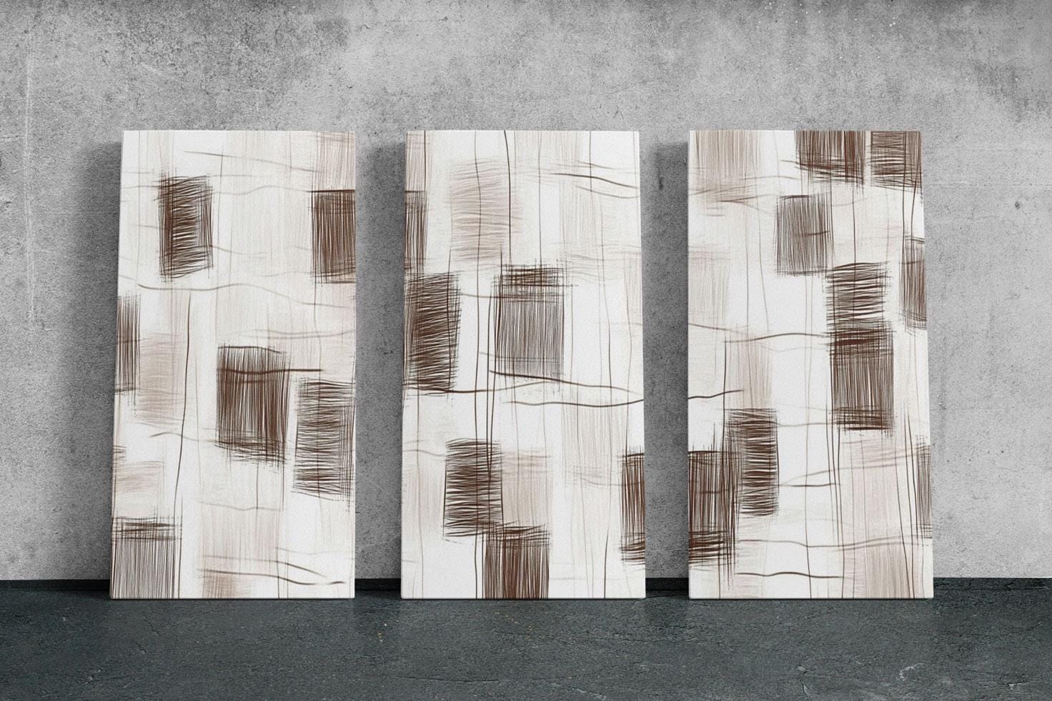 three pieces of art on a wall in a room