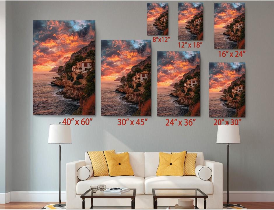The image is a living room with a white sofa and a coffee table. Above the sofa, there are seven framed pictures of a sunset over a cliff, each with a different size and resolution. The pictures are arranged in a grid-like pattern on the wall, with each one depicting a different angle and perspective of the sunset.