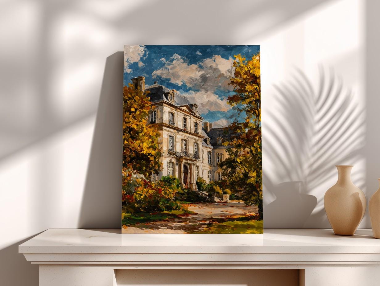 a painting of a large, ornate building surrounded by trees with autumn foliage, displayed on a white shelf against a white wall.