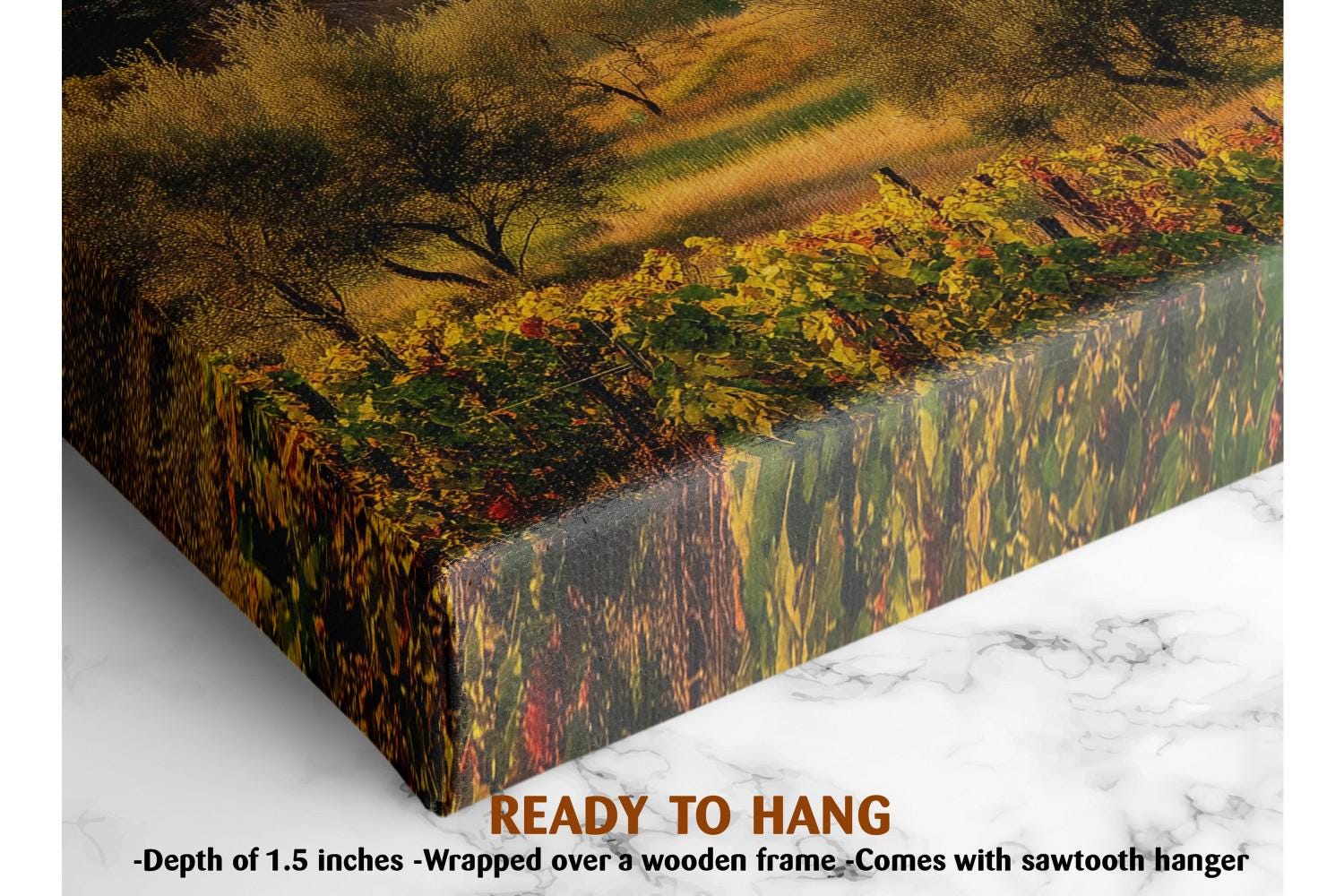 The image is a close-up of a framed print depicting a lush, colorful landscape with trees and foliage. The print is described as a &quot;Ready to Hang&quot; size, which means it is 1.5 inches deep. The print is wrapped over a wooden frame, and it comes with a sawtooth hanger, which is a type of hanging hardware designed for hanging framed items.