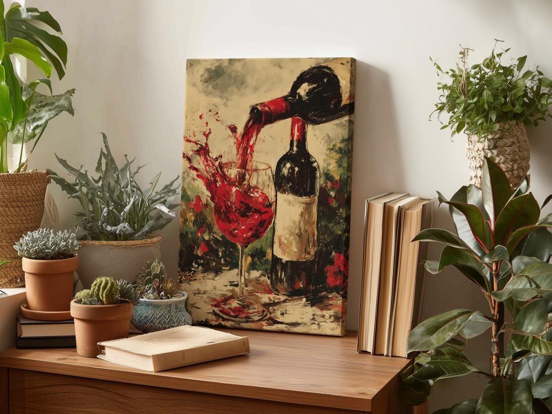 a wooden table with a painting of a wine glass and a bottle of wine, surrounded by potted plants and books.