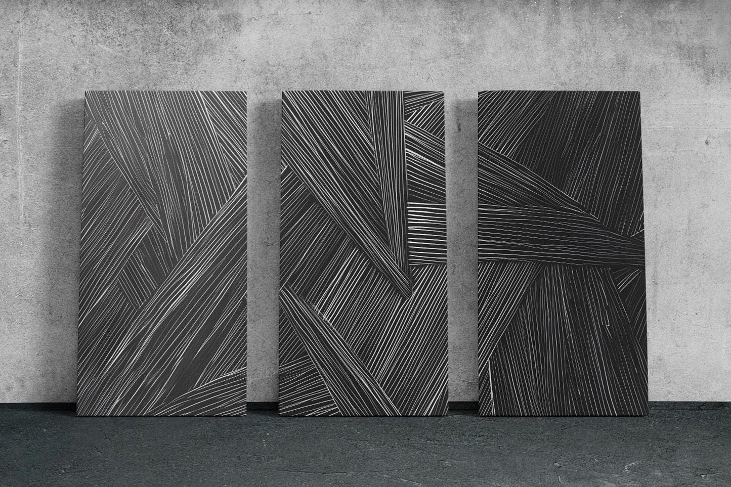 a black and white photo of three abstract paintings