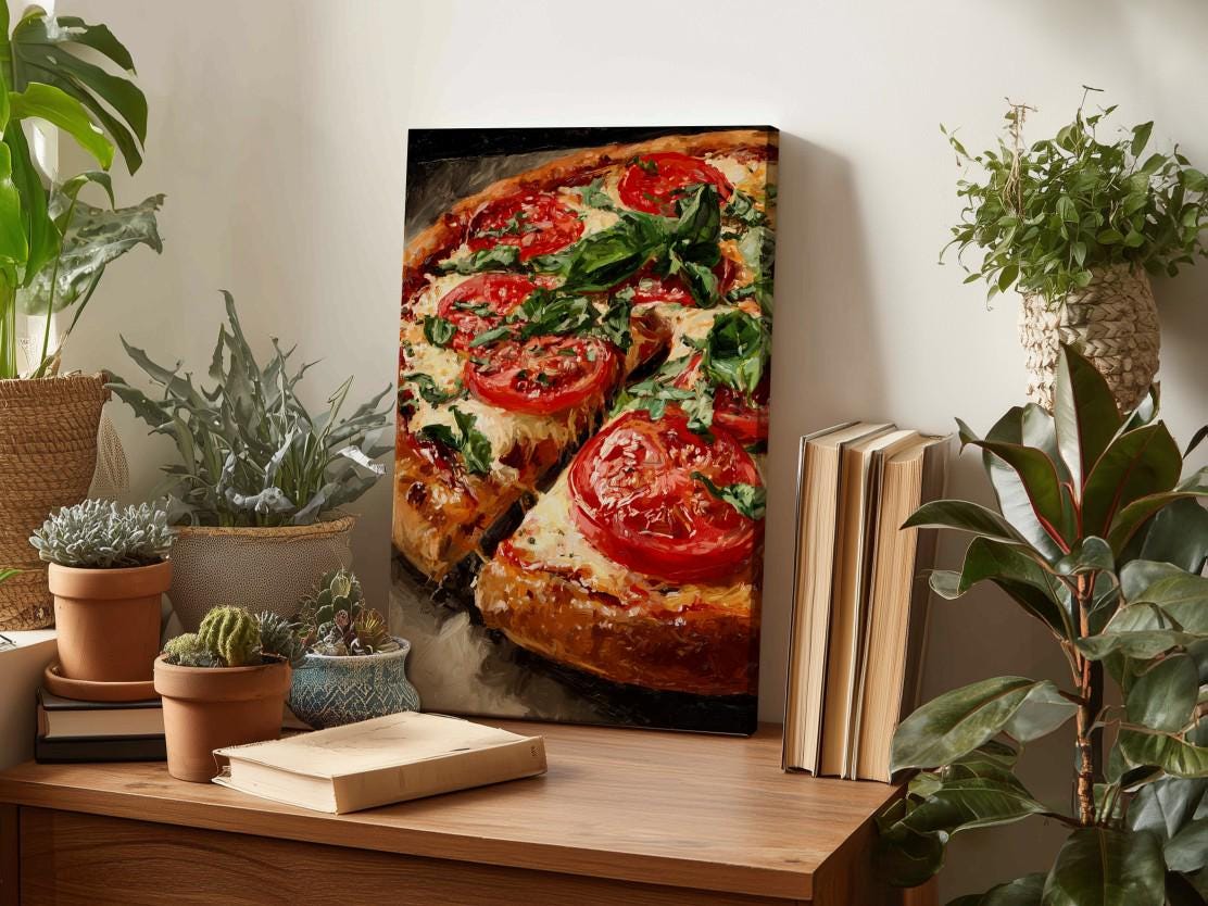 a wooden table with a framed painting of a pizza, surrounded by potted plants and books, creating a cozy and inviting atmosphere.