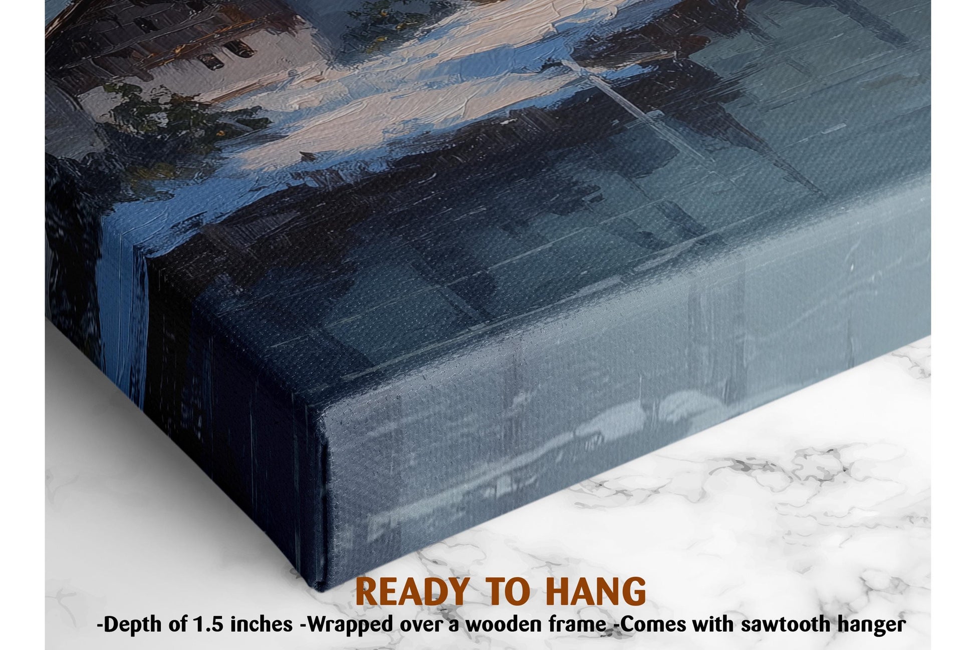 The image is a close-up of a painting on canvas, with a wooden frame. The painting depicts a cityscape with buildings and trees. The text indicates that the painting is ready to hang and measures 1.5 inches deep.