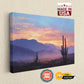The image is a painting of a desert landscape at sunset, featuring mountains and cacti silhouetted against a colorful sky.