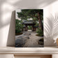 a serene Japanese garden with a traditional wooden gate and a stone path leading to a temple entrance.